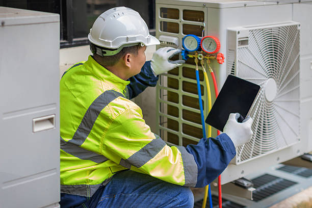 Professional Hvac technician working in Weaver, AL